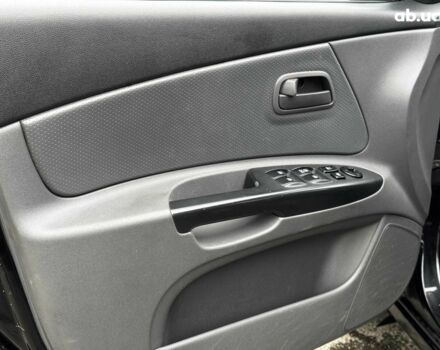 Чорний Кіа Ріо, об'ємом двигуна 1.4 л та пробігом 151 тис. км за 6490 $, фото 25 на Automoto.ua