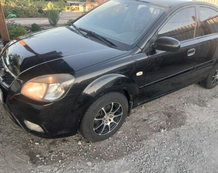 Чорний Кіа Ріо, об'ємом двигуна 1.4 л та пробігом 210 тис. км за 4308 $, фото 11 на Automoto.ua