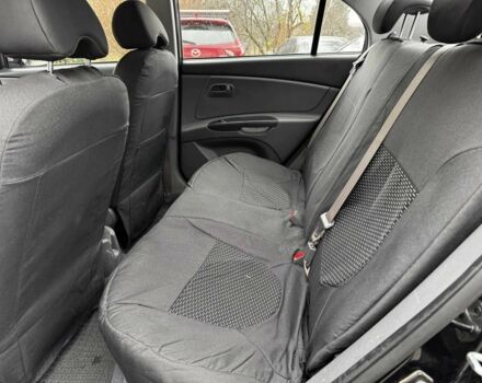 Черный Киа Рио, объемом двигателя 1.4 л и пробегом 151 тыс. км за 6490 $, фото 9 на Automoto.ua