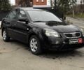 Чорний Кіа Ріо, об'ємом двигуна 1.4 л та пробігом 151 тис. км за 6490 $, фото 7 на Automoto.ua