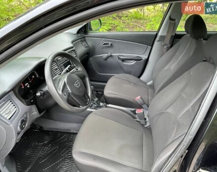 Черный Киа Рио, объемом двигателя 1.4 л и пробегом 91 тыс. км за 4500 $, фото 7 на Automoto.ua