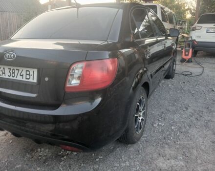 Чорний Кіа Ріо, об'ємом двигуна 1.4 л та пробігом 210 тис. км за 4308 $, фото 9 на Automoto.ua