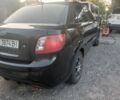 Чорний Кіа Ріо, об'ємом двигуна 1.4 л та пробігом 210 тис. км за 4308 $, фото 9 на Automoto.ua