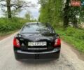 Черный Киа Рио, объемом двигателя 1.4 л и пробегом 91 тыс. км за 4500 $, фото 11 на Automoto.ua