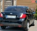 Черный Киа Рио, объемом двигателя 1.4 л и пробегом 151 тыс. км за 4500 $, фото 23 на Automoto.ua