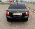Чорний Кіа Ріо, об'ємом двигуна 1.4 л та пробігом 189 тис. км за 5463 $, фото 1 на Automoto.ua