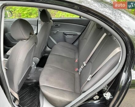Черный Киа Рио, объемом двигателя 1.4 л и пробегом 91 тыс. км за 4500 $, фото 4 на Automoto.ua