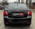 Чорний Кіа Ріо, об'ємом двигуна 1.4 л та пробігом 151 тис. км за 6490 $, фото 13 на Automoto.ua