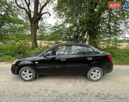 Чорний Кіа Ріо, об'ємом двигуна 1.4 л та пробігом 91 тис. км за 4500 $, фото 3 на Automoto.ua