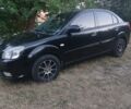 Чорний Кіа Ріо, об'ємом двигуна 1.4 л та пробігом 210 тис. км за 4308 $, фото 1 на Automoto.ua