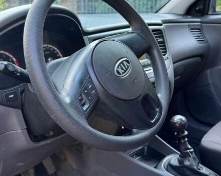 Чорний Кіа Ріо, об'ємом двигуна 1.4 л та пробігом 159 тис. км за 2999 $, фото 2 на Automoto.ua