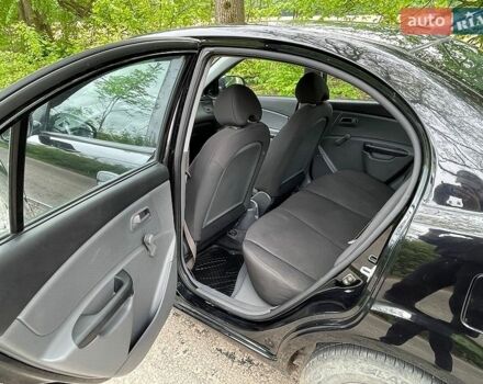 Черный Киа Рио, объемом двигателя 1.4 л и пробегом 91 тыс. км за 4800 $, фото 6 на Automoto.ua