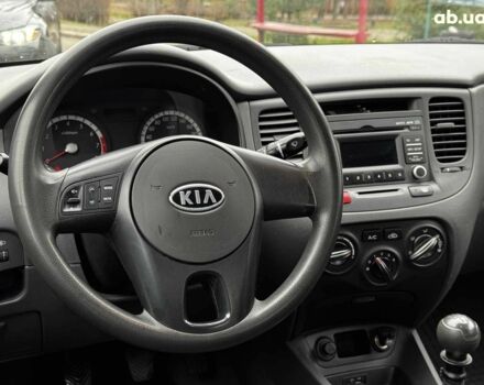 Чорний Кіа Ріо, об'ємом двигуна 1.4 л та пробігом 151 тис. км за 6490 $, фото 24 на Automoto.ua