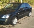 Чорний Кіа Ріо, об'ємом двигуна 1.4 л та пробігом 243 тис. км за 4900 $, фото 1 на Automoto.ua