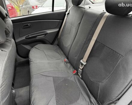 Чорний Кіа Ріо, об'ємом двигуна 1.4 л та пробігом 151 тис. км за 6490 $, фото 22 на Automoto.ua