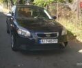 Чорний Кіа Ріо, об'ємом двигуна 1.4 л та пробігом 248 тис. км за 4650 $, фото 1 на Automoto.ua