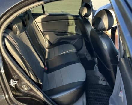 Черный Киа Рио, объемом двигателя 1.4 л и пробегом 140 тыс. км за 5500 $, фото 6 на Automoto.ua