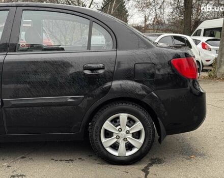 Чорний Кіа Ріо, об'ємом двигуна 1.4 л та пробігом 151 тис. км за 6490 $, фото 17 на Automoto.ua