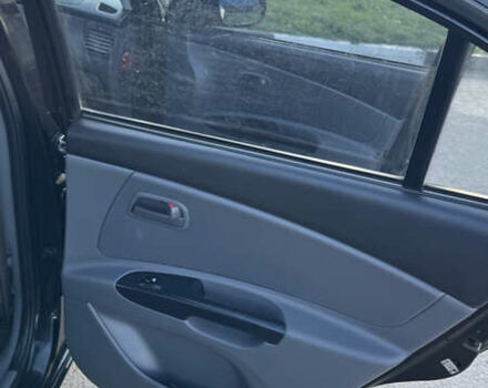 Чорний Кіа Ріо, об'ємом двигуна 1.5 л та пробігом 154 тис. км за 6900 $, фото 24 на Automoto.ua