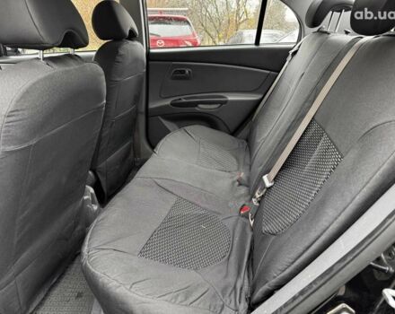 Чорний Кіа Ріо, об'ємом двигуна 1.4 л та пробігом 151 тис. км за 6490 $, фото 21 на Automoto.ua