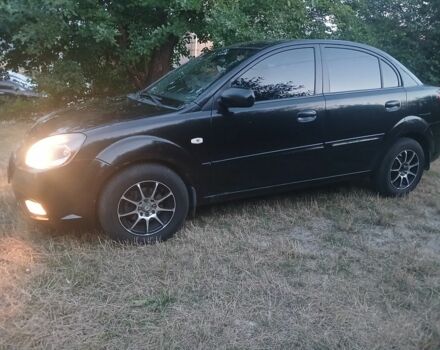 Чорний Кіа Ріо, об'ємом двигуна 1.4 л та пробігом 210 тис. км за 4308 $, фото 1 на Automoto.ua