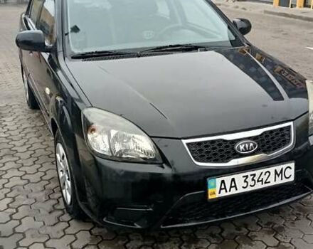 Черный Киа Рио, объемом двигателя 1.4 л и пробегом 150 тыс. км за 6000 $, фото 2 на Automoto.ua