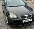 Черный Киа Рио, объемом двигателя 1.4 л и пробегом 150 тыс. км за 6000 $, фото 2 на Automoto.ua
