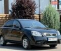 Черный Киа Рио, объемом двигателя 1.4 л и пробегом 151 тыс. км за 4500 $, фото 12 на Automoto.ua