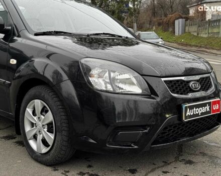 Чорний Кіа Ріо, об'ємом двигуна 1.4 л та пробігом 151 тис. км за 6490 $, фото 5 на Automoto.ua