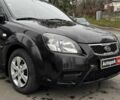 Чорний Кіа Ріо, об'ємом двигуна 1.4 л та пробігом 151 тис. км за 6490 $, фото 5 на Automoto.ua