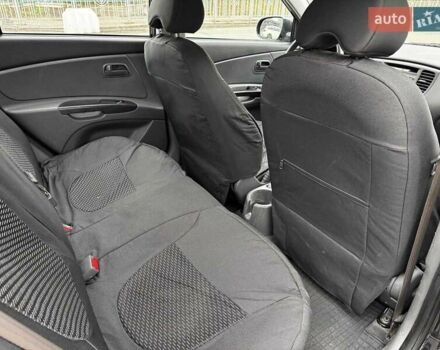 Черный Киа Рио, объемом двигателя 1.4 л и пробегом 151 тыс. км за 6490 $, фото 39 на Automoto.ua