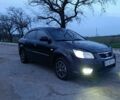 Чорний Кіа Ріо, об'ємом двигуна 1.4 л та пробігом 280 тис. км за 5300 $, фото 1 на Automoto.ua