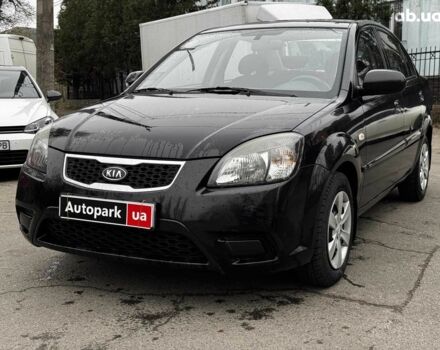 Чорний Кіа Ріо, об'ємом двигуна 1.4 л та пробігом 151 тис. км за 6490 $, фото 1 на Automoto.ua