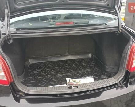 Черный Киа Рио, объемом двигателя 1.4 л и пробегом 150 тыс. км за 6000 $, фото 5 на Automoto.ua