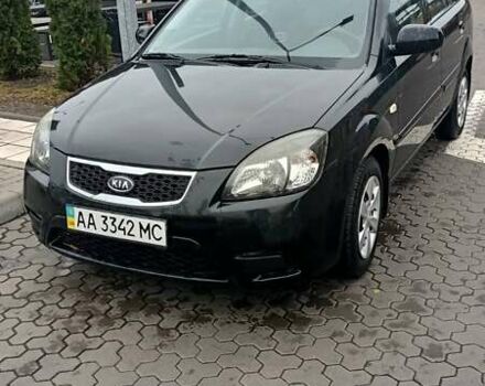 Черный Киа Рио, объемом двигателя 1.4 л и пробегом 150 тыс. км за 6000 $, фото 1 на Automoto.ua