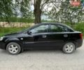 Черный Киа Рио, объемом двигателя 1.4 л и пробегом 91 тыс. км за 4500 $, фото 20 на Automoto.ua