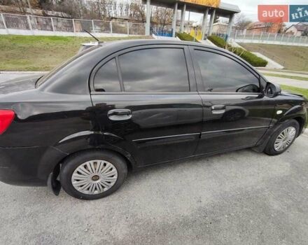 Чорний Кіа Ріо, об'ємом двигуна 1.4 л та пробігом 253 тис. км за 4000 $, фото 10 на Automoto.ua