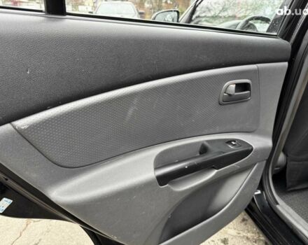 Чорний Кіа Ріо, об'ємом двигуна 1.4 л та пробігом 151 тис. км за 6490 $, фото 20 на Automoto.ua