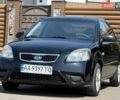 Черный Киа Рио, объемом двигателя 1.4 л и пробегом 151 тыс. км за 4500 $, фото 1 на Automoto.ua
