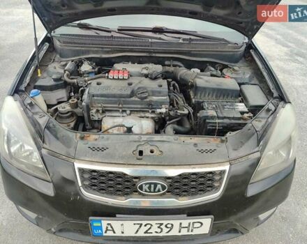 Чорний Кіа Ріо, об'ємом двигуна 1.4 л та пробігом 253 тис. км за 4000 $, фото 6 на Automoto.ua