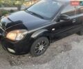 Чорний Кіа Ріо, об'ємом двигуна 1.4 л та пробігом 210 тис. км за 4700 $, фото 1 на Automoto.ua