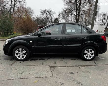 Чорний Кіа Ріо, об'ємом двигуна 1.4 л та пробігом 151 тис. км за 6490 $, фото 18 на Automoto.ua