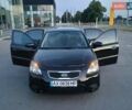 Черный Киа Рио, объемом двигателя 1.4 л и пробегом 150 тыс. км за 4500 $, фото 1 на Automoto.ua