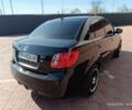 Черный Киа Рио, объемом двигателя 1.4 л и пробегом 182 тыс. км за 6500 $, фото 6 на Automoto.ua