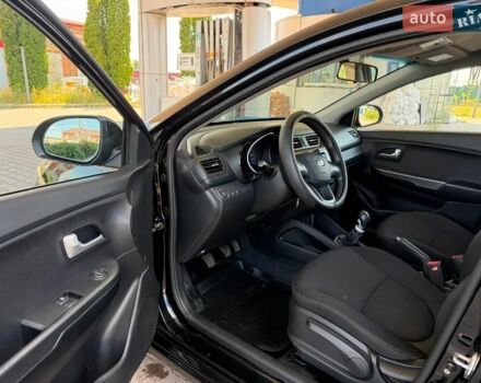 Чорний Кіа Ріо, об'ємом двигуна 1.4 л та пробігом 65 тис. км за 8300 $, фото 8 на Automoto.ua