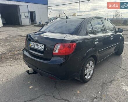 Чорний Кіа Ріо, об'ємом двигуна 1.4 л та пробігом 105 тис. км за 4400 $, фото 1 на Automoto.ua