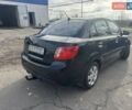 Чорний Кіа Ріо, об'ємом двигуна 1.4 л та пробігом 105 тис. км за 4400 $, фото 1 на Automoto.ua
