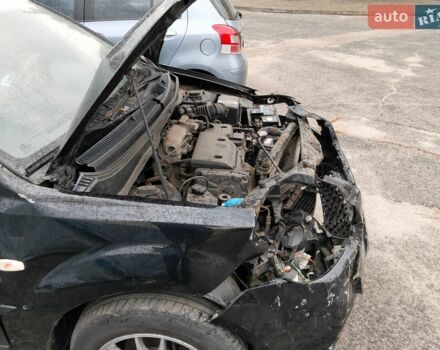 Чорний Кіа Ріо, об'ємом двигуна 1.4 л та пробігом 160 тис. км за 2450 $, фото 4 на Automoto.ua