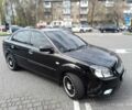 Черный Киа Рио, объемом двигателя 1.4 л и пробегом 182 тыс. км за 6500 $, фото 1 на Automoto.ua