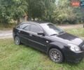 Черный Киа Рио, объемом двигателя 1.4 л и пробегом 133 тыс. км за 5900 $, фото 3 на Automoto.ua